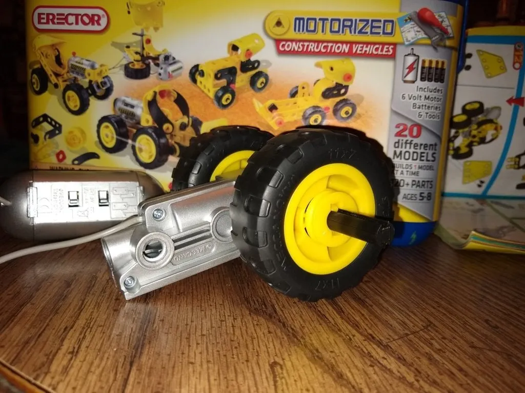 Motorized Erector Set electric metal construction building toy featuring battery powered motor moving parts gears and pulleys
