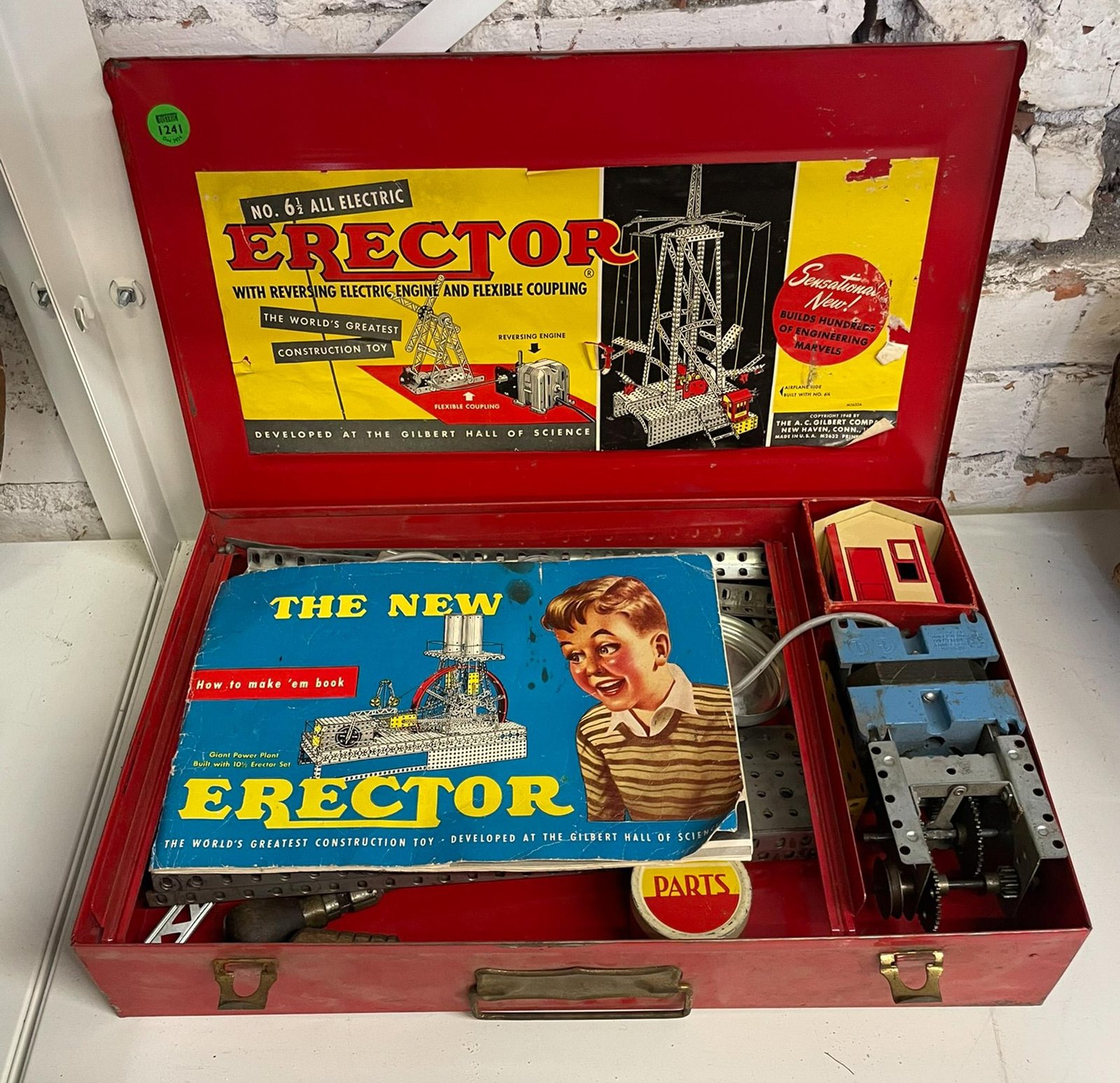 Original Erector Set authentic A.C. Gilbert metal construction building toy featuring classic vintage parts steel beams and red box
